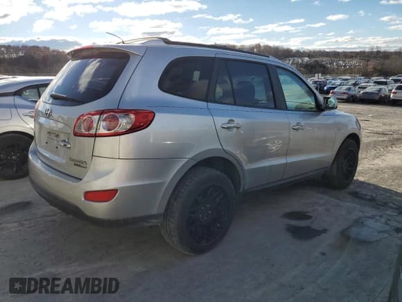 ✅ 2011 Hyundai Santa Fe Limited • VIN: 5XYZKDAG1BG044574 • Lot: 79920694. Listed on Copart with 291,582 mi. Free auction sales archive from the USA and detailed vehicle history report at DreamBid. Image 3.