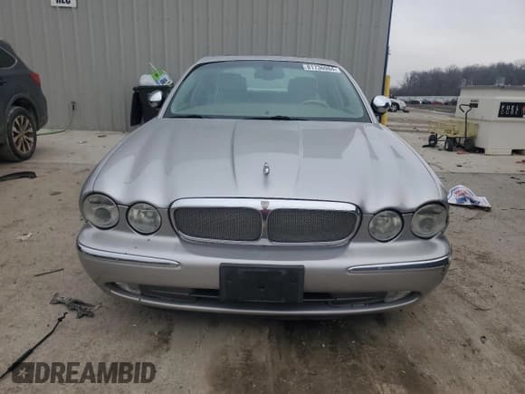 ✅ 2004 Jaguar XJ • VIN: SAJEA74C64SG08121 • Lot: 81736984. Listed on Copart with 100,144 mi. Free auction sales archive from the USA and detailed vehicle history report at DreamBid. Image 5.