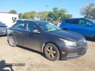 2014 Chevrolet Cruze 1LT with VIN 1G1PC5SB3E7481323, listed as a IAAI auction lot 43228447 with 106,554 mi miles and . Bid and sale history available at DreamBid. Image 1.