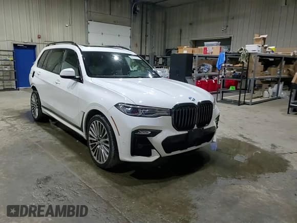 ✅ 2021 BMW X7 M50i • VIN: 5UXCX6C00M9F17552 • Lot: 65757375. Listed on Copart with 63,756 mi. Free auction sales archive from the USA and detailed vehicle history report at DreamBid. Image 14.