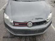 ✅ 2014 Volkswagen Golf GTI Wolfsburg Edition • VIN: WVWHD7AJ6EW002377 • Lot: 93031815. Wystawiony na Copart z przebiegiem 118 042 mil. Bezpłatny archiwum sprzedaży aukcyjnych z USA i szczegółowy raport historii pojazdu na DreamBid. Zdjęcie 11.