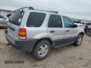 ✅ 2003 Ford Escape XLT Popular • VIN: 1FMCU03103KB75066 • Lot: 64523245. Listed on Copart with 228,232 mi. Free auction sales archive from the USA and detailed vehicle history report at DreamBid. Image 3.