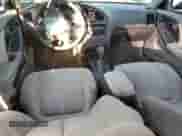 2004 Hyundai Elantra GLS z VIN KMHDN46D74U726145, wystawiony jako Copart lot #67103864 z przebiegiem 115 971 mil mil oraz Szkoda całkowita • Salvage title. Historia ofert i sprzedaży dostępna na DreamBid. Obrazek 8.