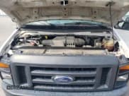 ✅ 2013 Ford Econoline Cargo Commercial • VIN: 1FTNE2EW4DDA93586 • Lot: 63841875. Listed on Copart with 205,807 mi. Free auction sales archive from the USA and detailed vehicle history report at DreamBid. Image 12.