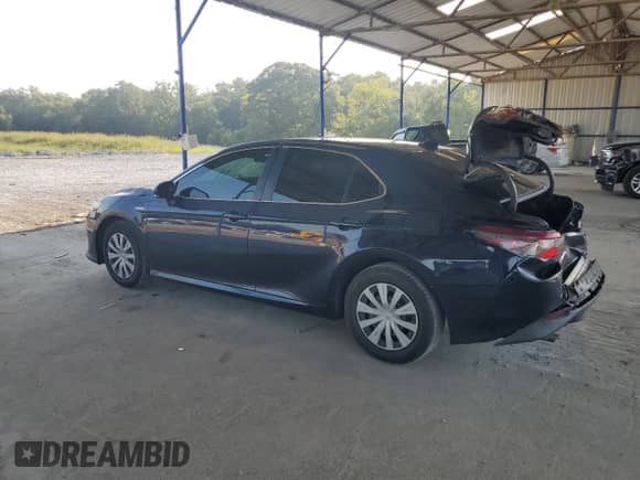 2021 Toyota Camry Hybrid LE with VIN 4T1C31AK6MU562652, listed as a Copart auction lot 69326545 with 153,540 mi miles and Salvage title. Bid and sale history available at DreamBid. Image 2.