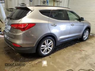 ✅ 2016 Hyundai Santa Fe • VIN: 5XYZW4LA2GG372073 • Лот: 39466403. Опубликован ранее на Copart с пробегом 98 803 миль. Бесплатный доступ к архиву аукционных продаж из США и подробный отчёт об истории автомобиля на DreamBid. Изображение 3.