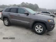 ✅ 2015 Jeep Grand Cherokee Laredo • VIN: 1C4RJEAG5FC700519 • Lot: 93738715. Wystawiony na Copart z przebiegiem 143 110 mil. Bezpłatny archiwum sprzedaży aukcyjnych z USA i szczegółowy raport historii pojazdu na DreamBid. Zdjęcie 4.