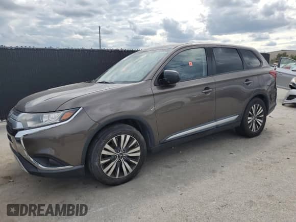 2019 Mitsubishi Outlander ES z VIN JA4AD2A32KZ022197, wystawiony jako Copart lot #80742515 z przebiegiem 207 015 mil mil oraz Czysty tytuł • Clean title. Historia ofert i sprzedaży dostępna na DreamBid. Obrazek 1.