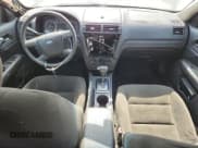 ✅ 2007 Ford Fusion SE • VIN: 3FAHP07157R198832 • Lot: 80119425. Wystawiony na Copart z przebiegiem 293 423 mil. Bezpłatny archiwum sprzedaży aukcyjnych z USA i szczegółowy raport historii pojazdu na DreamBid. Zdjęcie 8.