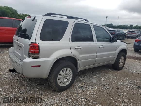 2006 Mercury Mariner Luxury z VIN 4M2CU56196KJ17209, wystawiony jako Copart lot #58450665 z przebiegiem 239 728 mil mil oraz Szkoda całkowita • Salvage title. Historia ofert i sprzedaży dostępna na DreamBid. Obrazek 3.