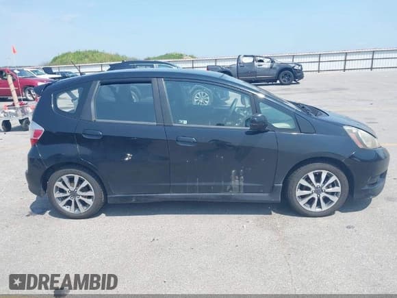 ✅ 2013 Honda Fit Sport • VIN: JHMGE8H54DC011102 • Lot: 43661458. Listed on IAAI with 212,999 mi. Free auction sales archive from the USA and detailed vehicle history report at DreamBid. Image 12.
