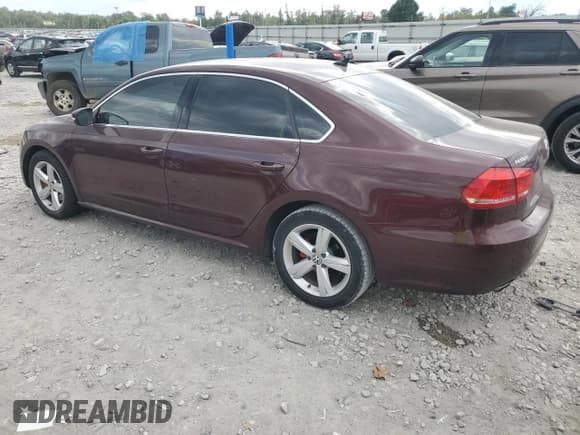 ✅ 2013 Volkswagen Passat SE • VIN: 1VWBP7A32DC009581 • Lot: 85579565. Listed on Copart with 122,576 mi. Free auction sales archive from the USA and detailed vehicle history report at DreamBid. Image 2.