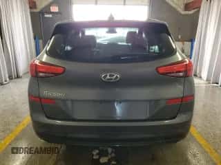 2019 Hyundai Tucson SE z VIN KM8J23A47KU000313, wystawiony jako Copart lot #90115815 z przebiegiem 99 228 mil mil oraz Czysty tytuł • Clean title. Historia ofert i sprzedaży dostępna na DreamBid. Obrazek 6.