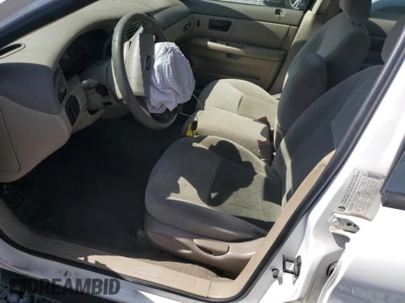 ✅ 2006 Ford Taurus SE • VIN: 1FAFP53256A125309 • Lot: 80096585. Listed on Copart with 243,463 mi. Free auction sales archive from the USA and detailed vehicle history report at DreamBid. Image 7.