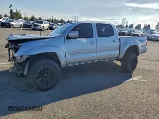 ✅ 2005 Toyota Tacoma PreRunner • VIN: 5TEJU62N65Z022483 • Lot: 93952035. Listed on Copart with 170,693 mi. Free auction sales archive from the USA and detailed vehicle history report at DreamBid. Image 1.