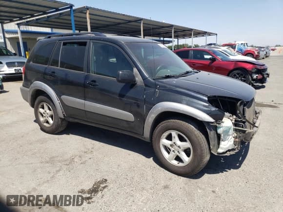 ✅ 2001 Toyota RAV4 • VIN: JTEHH20V010075765 • Lot: 58959485. Listed on Copart with 118,687 mi. Free auction sales archive from the USA and detailed vehicle history report at DreamBid. Image 4.