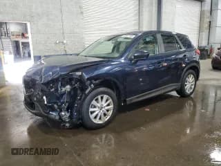 ✅ 2015 Mazda CX-5 Touring • VIN: JM3KE4CY1F0456222 • Lot: 84007185. Listed on Copart with 163,237 mi. Free auction sales archive from the USA and detailed vehicle history report at DreamBid. Image 1.