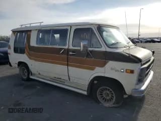 ✅ 1979 GMC Vandura • VIN: TGR2597506100 • Lot: 51086615. Wystawiony na Copart z przebiegiem 25 002 mil. Bezpłatny archiwum sprzedaży aukcyjnych z USA i szczegółowy raport historii pojazdu na DreamBid. Zdjęcie 4.