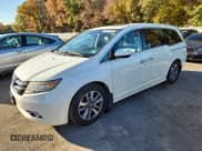 ✅ 2015 Honda Odyssey Touring Elite • VIN: 5FNRL5H97FB015989 • Lot: 90214345. Wystawiony na Copart z przebiegiem 99 074 mil. Bezpłatny archiwum sprzedaży aukcyjnych z USA i szczegółowy raport historii pojazdu na DreamBid. Zdjęcie 1.