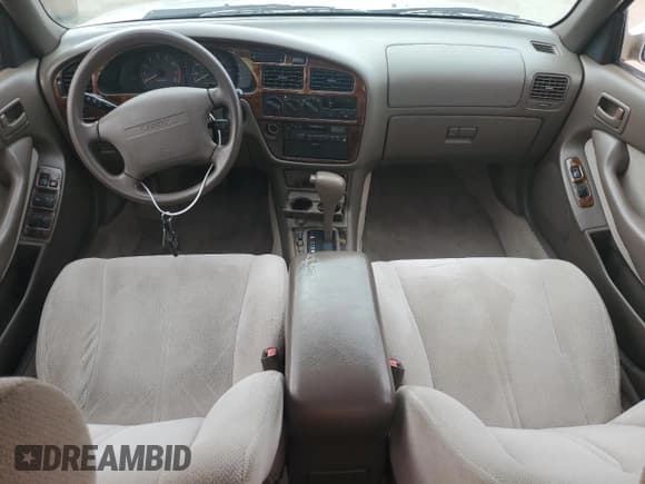 ✅ 1995 Toyota Camry LE • VIN: JT2GK12E4S0086805 • Lot: 45793885. Wystawiony na Copart z przebiegiem 138 015 mil. Bezpłatny archiwum sprzedaży aukcyjnych z USA i szczegółowy raport historii pojazdu na DreamBid. Zdjęcie 8.