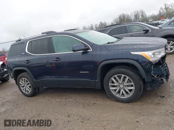 ✅ 2017 GMC Acadia SLE • VIN: 1GKKNSLAXHZ281407 • Lot: 41911752. Listed on IAAI with 142,418 mi. Free auction sales archive from the USA and detailed vehicle history report at DreamBid. Image 14.
