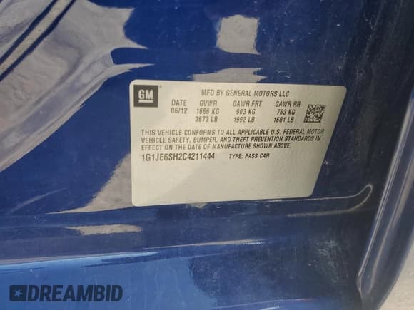 ✅ 2012 Chevrolet Sonic LTZ • VIN: 1G1JE6SH2C4211444 • Lot: 54013075. Listed on Copart with 97,378 mi. Free auction sales archive from the USA and detailed vehicle history report at DreamBid. Image 12.