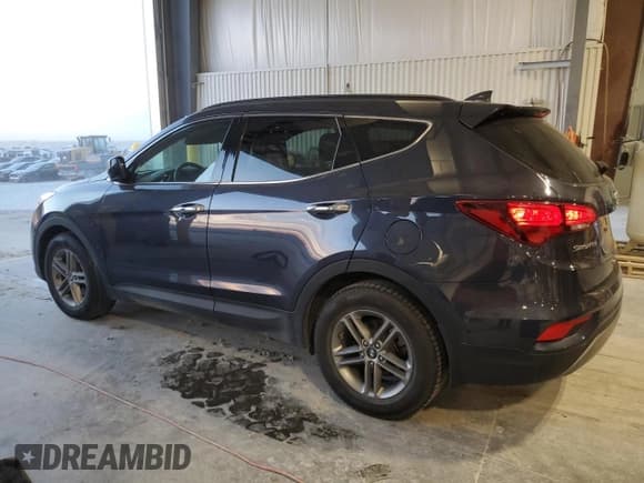 ✅ 2017 Hyundai Santa Fe 2.4L • VIN: 5XYZUDLB8HG420675 • Лот: 90927905. Опубликован ранее на Copart с пробегом 64 271 миль. Бесплатный доступ к архиву аукционных продаж из США и подробный отчёт об истории автомобиля на DreamBid. Изображение 2.