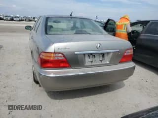 ✅ 2002 Acura RL • VIN: JH4KA96562C001280 • Лот: 74716484. Опубликован ранее на Copart с пробегом Не указан. Бесплатный доступ к архиву аукционных продаж из США и подробный отчёт об истории автомобиля на DreamBid. Изображение 6.
