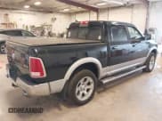 ✅ 2015 Ram 1500 Laramie • VIN: 1C6RR7NT7FS515722 • Lot: 43568705. Listed on IAAI with 118,131 mi. Free auction sales archive from the USA and detailed vehicle history report at DreamBid. Image 4.