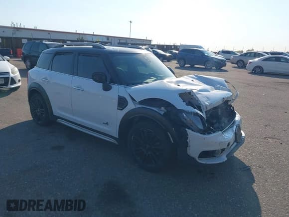 ✅ 2020 MINI Countryman Cooper • VIN: WMZYW5C07L3L15441 • Lot: 42885459. Listed on IAAI with 84,825 mi. Free auction sales archive from the USA and detailed vehicle history report at DreamBid. Image 1.