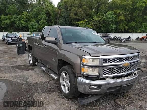 2014 Chevrolet Silverado 1500 LT z VIN 1GCRCREH6EZ202605, wystawiony jako Copart lot #71173055 z przebiegiem 150 202 mil mil oraz Szkoda całkowita • Salvage title. Historia ofert i sprzedaży dostępna na DreamBid. Obrazek 13.
