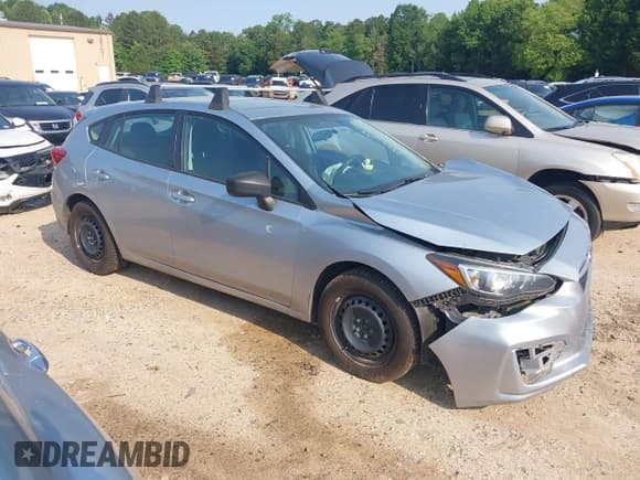 ✅ 2017 Subaru Impreza • VIN: 4S3GTAA63H1734443 • Lot: 42392197. Listed on IAAI with 141,479 mi. Free auction sales archive from the USA and detailed vehicle history report at DreamBid. Image 1.