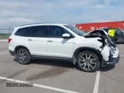 ✅ 2022 Honda Pilot Touring 7-Passenger • VIN: 5FNYF6H62NB078544 • Лот: 42913308. Опубликован ранее на IAAI с пробегом 39 197 миль. Бесплатный доступ к архиву аукционных продаж из США и подробный отчёт об истории автомобиля на DreamBid. Изображение 13.