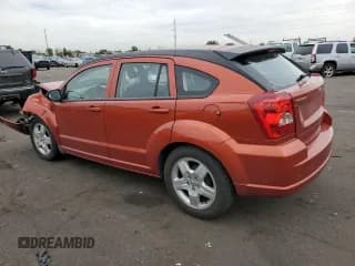 ✅ 2009 Dodge Caliber SXT • VIN: 1B3HB48A29D157571 • Лот: 71870254. Опубликован ранее на Copart с пробегом 176 514 миль. Бесплатный доступ к архиву аукционных продаж из США и подробный отчёт об истории автомобиля на DreamBid. Изображение 2.