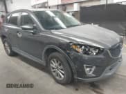 ✅ 2014 Mazda CX-5 Touring • VIN: JM3KE4CY0E0430130 • Lot: 43830898. Wystawiony na IAAI z przebiegiem 169 053 mil. Bezpłatny archiwum sprzedaży aukcyjnych z USA i szczegółowy raport historii pojazdu na DreamBid. Zdjęcie 1.