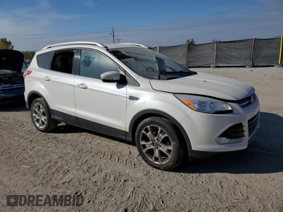 ✅ 2014 Ford Escape Titanium • VIN: 1FMCU0JX9EUA28520 • Лот: 82393815. Опубликован ранее на Copart с пробегом 136 413 миль. Бесплатный доступ к архиву аукционных продаж из США и подробный отчёт об истории автомобиля на DreamBid. Изображение 4.