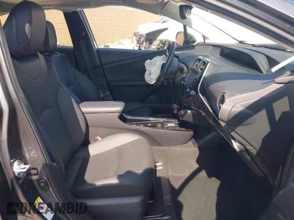 2021 Toyota Prius L Eco with VIN JTDKAMFU4M3144985, listed as a IAAI auction lot 42443957 with 20,816 mi miles and . Bid and sale history available at DreamBid. Image 5.