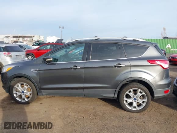 ✅ 2015 Ford Escape Titanium • VIN: 1FMCU9JX8FUC53453 • Лот: 43658204. Опубликован ранее на IAAI с пробегом 195 097 миль. Бесплатный доступ к архиву аукционных продаж из США и подробный отчёт об истории автомобиля на DreamBid. Изображение 14.