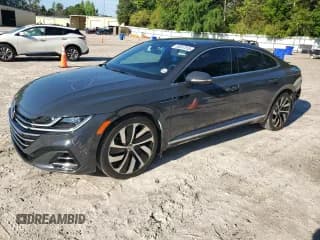✅ 2021 Volkswagen Arteon SEL R-Line • VIN: WVWSR7AN1ME013138 • Лот: 55557515. Опубликован ранее на Copart с пробегом 73 415 миль. Бесплатный доступ к архиву аукционных продаж из США и подробный отчёт об истории автомобиля на DreamBid. Изображение 1.