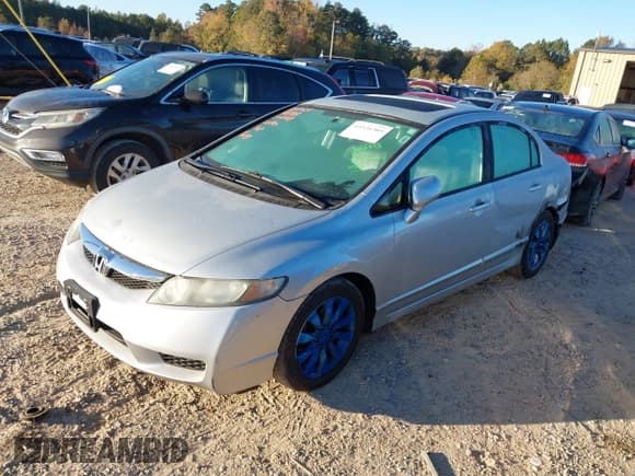 ✅ 2010 Honda Civic EX-L • VIN: 2HGFA1F97AH312169 • Lot: 43521305. Listed on IAAI with 219,389 mi. Free auction sales archive from the USA and detailed vehicle history report at DreamBid. Image 2.