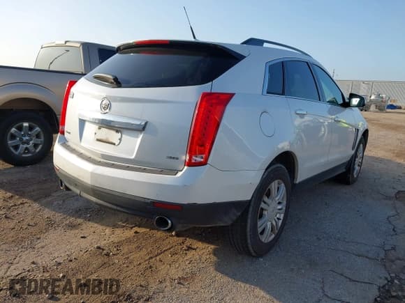 ✅ 2013 Cadillac SRX • VIN: 3GYFNAE36DS618498 • Lot: 42454872. Wystawiony na IAAI z przebiegiem 161 236 mil. Bezpłatny archiwum sprzedaży aukcyjnych z USA i szczegółowy raport historii pojazdu na DreamBid. Zdjęcie 4.