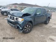 ✅ 2013 Nissan Frontier SV • VIN: 1N6AD0EV7DN730152 • Lot: 43266939. Listed on IAAI with 113,060 mi. Free auction sales archive from the USA and detailed vehicle history report at DreamBid. Image 2.