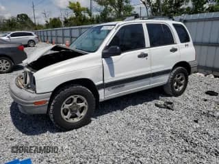 ✅ 1999 Chevrolet Tracker • VIN: 2CNBJ13CXX6914447 • Лот: 64100275. Опубликован ранее на Copart с пробегом 245 410 миль. Бесплатный доступ к архиву аукционных продаж из США и подробный отчёт об истории автомобиля на DreamBid. Изображение 1.