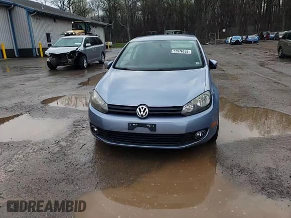 ✅ 2012 Volkswagen Golf TDI w/Tech Pkg • VIN: WVWMM7AJ2CW113181 • Lot: 52576855. Listed on Copart with 100,589 mi. Free auction sales archive from the USA and detailed vehicle history report at DreamBid. Image 11.