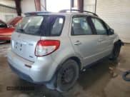 ✅ 2010 Suzuki SX4 • VIN: JS2YB5A31A6311329 • Lot: 85900435. Wystawiony na Copart z przebiegiem 131 172 mil. Bezpłatny archiwum sprzedaży aukcyjnych z USA i szczegółowy raport historii pojazdu na DreamBid. Zdjęcie 3.