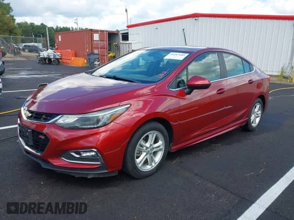 2018 Chevrolet Cruze LT with VIN 1G1BE5SM4J7217012, listed as a IAAI auction lot 43287685 with 125,689 mi miles and . Bid and sale history available at DreamBid. Image 2.