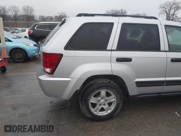 ✅ 2005 Jeep Grand Cherokee Laredo • VIN: 1J4HR48N45C659876 • Lot: 43775770. Listed on IAAI with 103,071 mi. Free auction sales archive from the USA and detailed vehicle history report at DreamBid. Image 15.