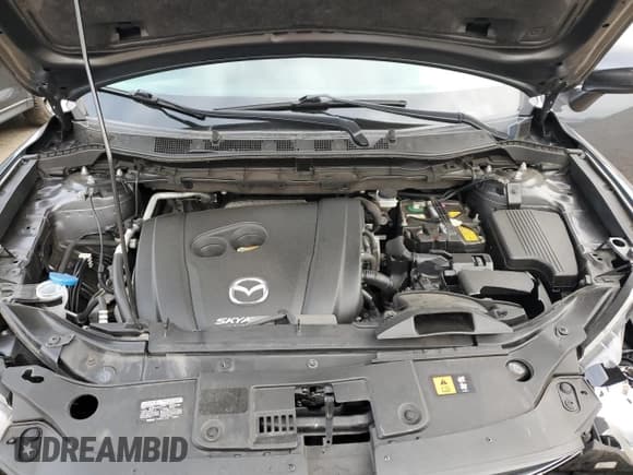 ✅ 2016 Mazda CX-5 Touring • VIN: JM3KE4CYXG0787043 • Lot: 90972585. Wystawiony na Copart z przebiegiem 99 074 mil. Bezpłatny archiwum sprzedaży aukcyjnych z USA i szczegółowy raport historii pojazdu na DreamBid. Zdjęcie 12.