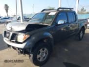 ✅ 2005 Nissan Frontier Nismo • VIN: 1N6AD07W45C460185 • Lot: 43621891. Listed on IAAI with 219,374 mi. Free auction sales archive from the USA and detailed vehicle history report at DreamBid. Image 2.