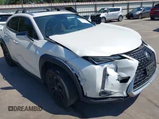 ✅ 2022 Lexus UX 200 • VIN: JTHX3JBH0N2047232 • Lot: 42296303. Listed on IAAI with 20,239 mi. Free auction sales archive from the USA and detailed vehicle history report at DreamBid. Image 1.
